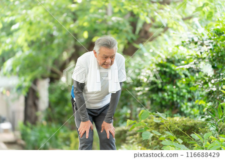 Senior man jogging, out of breath 116688429