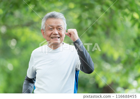 Senior man jogging, fresh greenery 116688455
