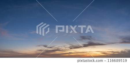 Bright colorful orange and yellow clouds on horizon. Beautiful sunset sky scenery Bright colorful orange and yellow clouds on horizon. Beautiful sunset sky scenery 116689519