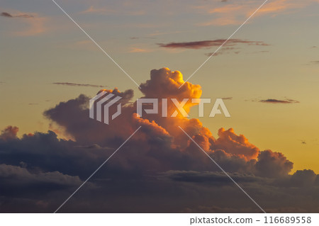 Amazing sunset skyscape. Evening sky with bright colorful orange and yellow clouds 116689558