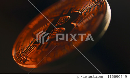 Close up of spinning golden bitcoin coin. BTC logo 116690549