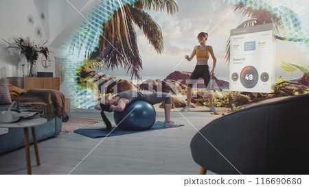 Athletic woman exercises with fitball. VR screen with virtual trainer and AR fitness app Athletic woman exercises with fitball. VR screen with virtual trainer and AR fitness app 116690680