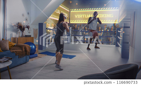 Athletic woman in AR headset starts online boxing training. VR screen with virtual trainer 116690733
