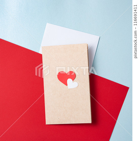 Love letter postcard with a red heart on a red and blue background. Concept of Valentine's day 116691411