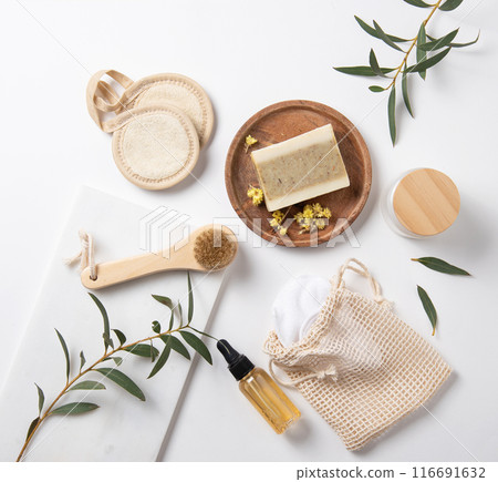 Flat lay beauty spa  with natural cosmetic products peeling natural soap, sponges, oil  116691632