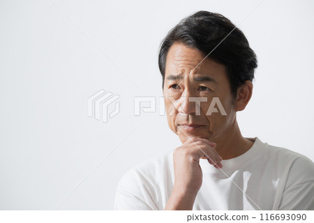 Senior man with hand on chin, image of beauty and skin care in his 50s Senior man with hand on chin, image of beauty and skin care in his 50s 116693090