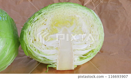 Fresh, juicy cabbage cut into pieces Fresh, juicy cabbage cut into pieces 116693907