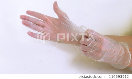 Wearing disposable nitrile gloves for hygiene 116693912