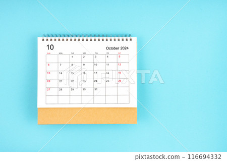 October 2024, Monthly desk calendar for 2024 year on blue background. October 2024, Monthly desk calendar for 2024 year on blue background. 116694332