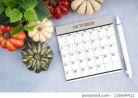 2024 October monthly calendar page and pen with a pumpkin. 2024 October monthly calendar page and pen with a pumpkin. 116694422