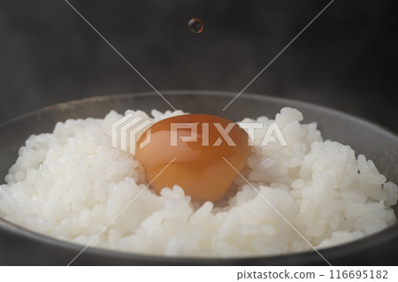 Raw egg on rice: Eggs with soy sauce Raw egg on rice: Eggs with soy sauce 116695182