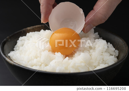 Freshly cooked rice with raw egg Freshly cooked rice with raw egg 116695208