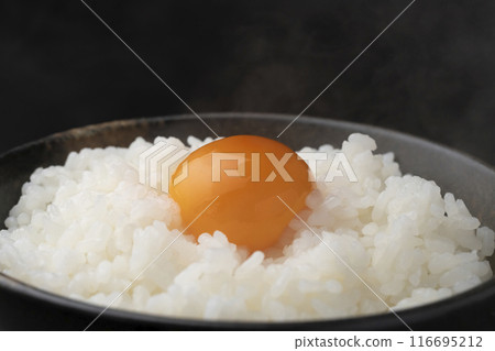 Freshly cooked rice with raw egg Freshly cooked rice with raw egg 116695212