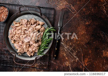 Canned tuna with fresh herbs ready for eat. Dark background. Top view. Copy space Canned tuna with fresh herbs ready for eat. Dark background. Top view. Copy space 116696017