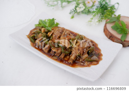 delicious spicy black pepper chicken feet as a background 116696809
