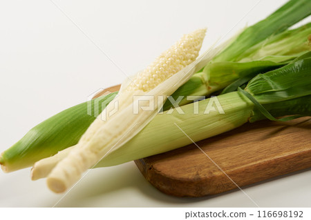 Young corn on a white background 116698192