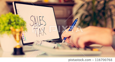 Sales tax note. Business concept of the amount of money a company pays its employees, paying taxes 116700768