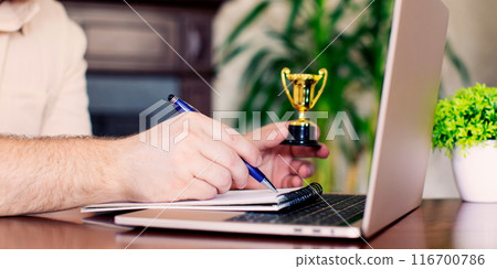 Businessman analyzing investment charts with laptop in office. Business and finance concept. Businessman analyzing investment charts with laptop in office. Business and finance concept. 116700786