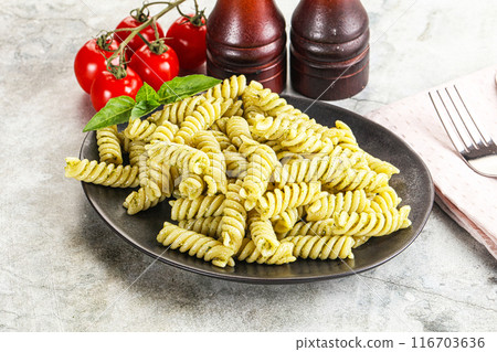 Italian pasta with basil pesto Italian pasta with basil pesto 116703636