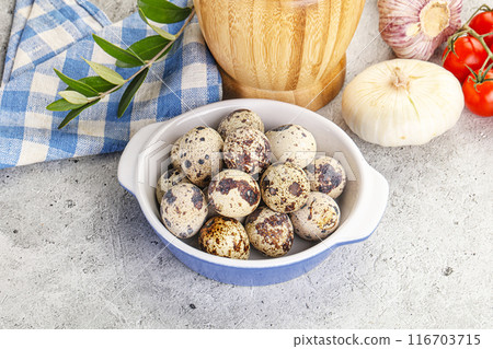 Raw quail eggs in the bowl Raw quail eggs in the bowl 116703715