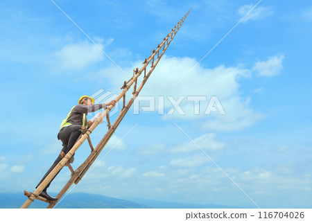 Asian business man engineer climbing up llong adder with blue sky, career growth and success concept 116704026