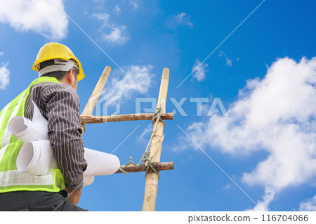 Asian business man engineer climbing up ladder with blue sky, career growth and success concept Asian business man engineer climbing up ladder with blue sky, career growth and success concept 116704066