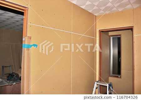 Construction site wallpapering for a newly built wooden house Construction site wallpapering for a newly built wooden house 116704326