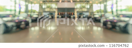 new cars in showroom interior blurred abstract background 116704762