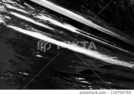 Black transparent plastic film wrap overlay texture background Black transparent plastic film wrap overlay texture background 116704799