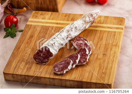 Spanish dry pork sausage Fuet 116705264