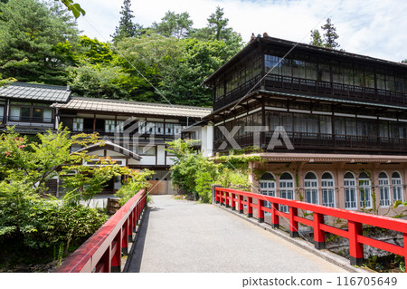 Shima Onsen in summer: Sekizenkan main building and Keiun Bridge 116705649