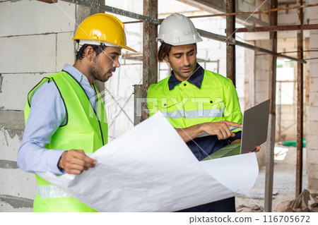man engineer builder house construction holding blueprint drawing. man engineer builder house construction holding blueprint drawing. 116705672