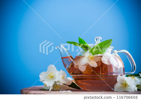 jasmine flower tea in a glass teapot 116706608