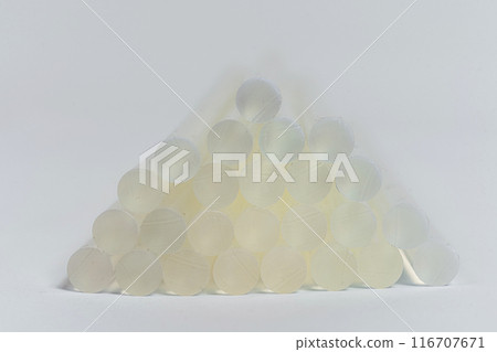 hot glue sticks on a white background. rods for pistol sizing of objects hot glue sticks on a white background. rods for pistol sizing of objects 116707671