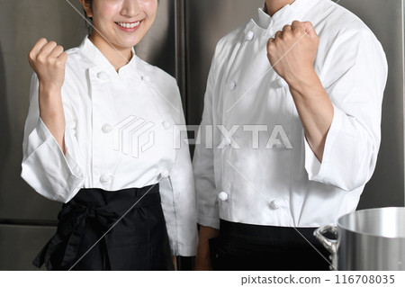 Young asian male and female chefs cooking in the kitchen 116708035