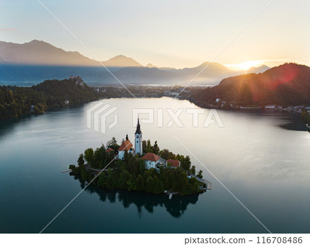 Drone shot flying. Slovenia. Lake Bled. Sunrise. Drone shot flying. Slovenia. Lake Bled. Sunrise. 116708486
