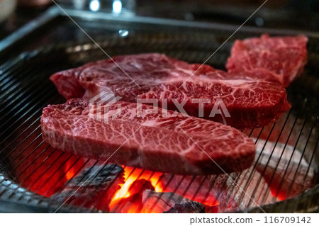 Hanwoo Beef, Korean Style Meat on the Grill. BBQ rare meat with soft focus Hanwoo Beef, Korean Style Meat on the Grill. BBQ rare meat with soft focus 116709142
