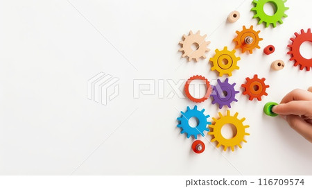 Tiny fingers trace the outlines of textured shapes, stimulating tactile senses and shape recognition 116709574