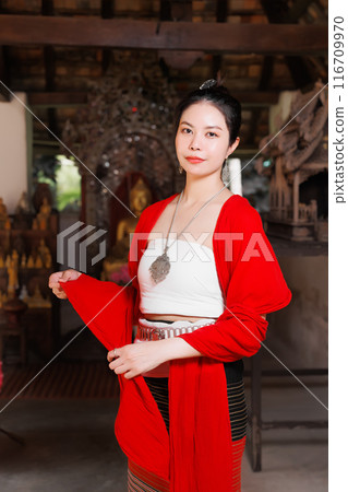 Northern Thai Chiangmai lanna people in traditional style clothes beautiful women old vintage dressing with paper umbrella at wat ton kwen. 116709970