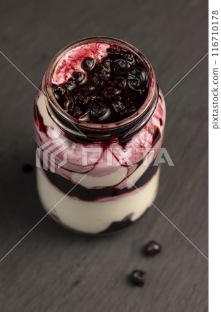 blueberries and sweet yogurt blueberries and sweet yogurt 116710178
