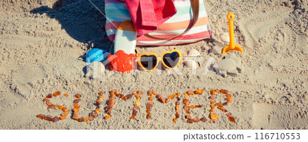 Inscription summer, accessories for relax or sunbathing and children toys for playing on beach Inscription summer, accessories for relax or sunbathing and children toys for playing on beach 116710553