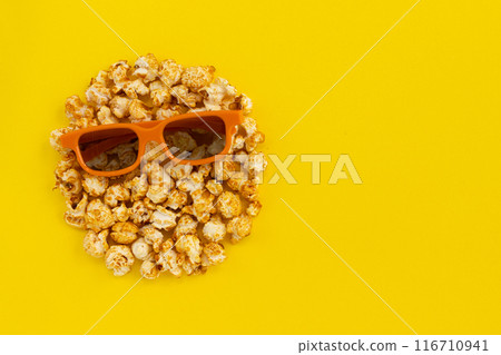 caramel popcorn and glasses, sweet snacks caramel popcorn and glasses, sweet snacks 116710941