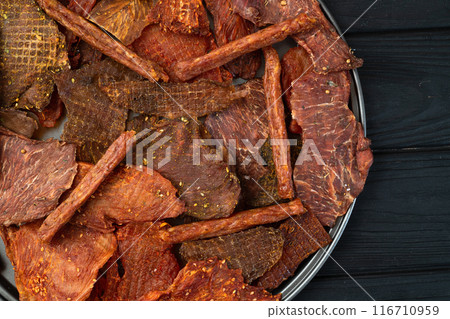 Mix of dried meat Jerky . From chicken , beef and pork. 116710959