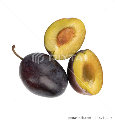 ripe plums isolated on white background, fruit in section 116710987