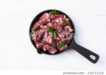 Raw chicken giblets hearts , meat background 116711159