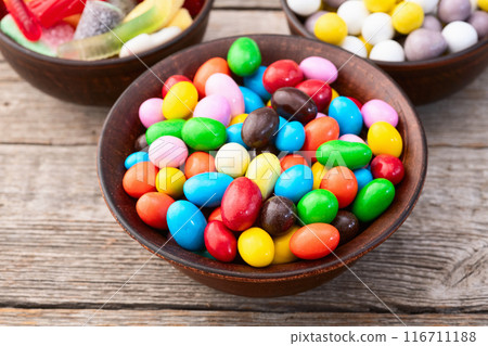 Mix of colorful candies . Multicolored unhealthy background. Sweet dessert 116711188