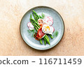 Asparagus and poached eggs 116711459