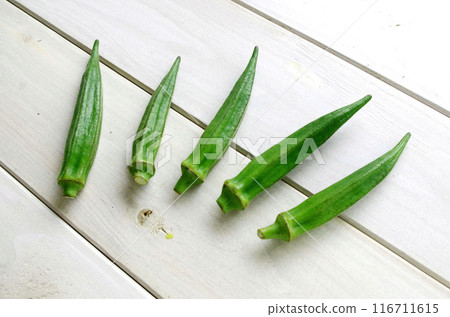 Okra vegetables summer vegetables shabby background 116711615