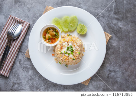 Crab Fried Rice and Chili Fish Sauce on a white plate Crab Fried Rice and Chili Fish Sauce on a white plate 116713895