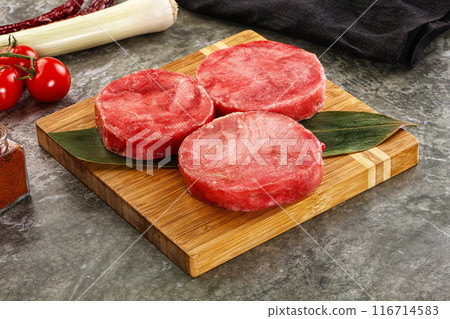 Delicous raw tuna medallion for cooking Delicous raw tuna medallion for cooking 116714583
